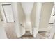 Hallway leading up to the second floor with freshly painted walls and new carpet at 462 W Broadway St, Greenwood, IN 46142