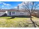 Spacious backyard featuring a concrete patio, a tree, and a grass lawn at 4722 Common View Cir, Indianapolis, IN 46220