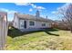 Backyard with a concrete patio and fenced yard at 4722 Common View Cir, Indianapolis, IN 46220