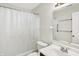 Bathroom with large mirror, vanity, toilet, shower, and chrome fixtures at 4722 Common View Cir, Indianapolis, IN 46220