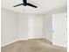 Bedroom features carpet floors, a ceiling fan, and a closet with sliding doors at 4722 Common View Cir, Indianapolis, IN 46220
