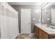 Well-lit bathroom with double vanity, tub-shower combination, and neutral finishes at 4732 Ashfield Dr, Westfield, IN 46062