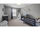 Bright bedroom featuring neutral walls, a playful teepee, and a twin bed with plush toys, creating a cozy, inviting space at 4732 Ashfield Dr, Westfield, IN 46062