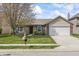 Charming single-Gathering home with brick and siding, a well-manicured lawn, and an attached two-car garage at 4732 Ashfield Dr, Westfield, IN 46062