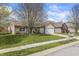 Single-story home with a two-car garage and landscaping in a suburban neighborhood with well-manicured lawn at 4732 Ashfield Dr, Westfield, IN 46062