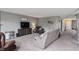 Comfortable living room with a neutral color scheme, plush seating, and modern entertainment center at 4732 Ashfield Dr, Westfield, IN 46062