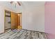 Bedroom with wood-look floors and closet at 477 S Restin Rd, Greenwood, IN 46142