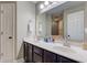 Bathroom includes a dual sink vanity with dark cabinets and a large mirror at 4889 Oakleigh Pkwy, Greenwood, IN 46143