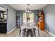Cozy dining room featuring a stylish table, chairs, and natural lighting at 4889 Oakleigh Pkwy, Greenwood, IN 46143