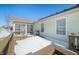 View of a back deck including a closed-in patio, perfect for entertaining or relaxing outside at 5316 Twin Bridge Blvd, Indianapolis, IN 46239