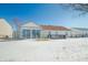 A spacious backyard offers plenty of room for activities, along with a sunroom and deck at 5316 Twin Bridge Blvd, Indianapolis, IN 46239