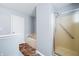 Bathroom featuring a glass enclosed shower and separate soaking tub at 5316 Twin Bridge Blvd, Indianapolis, IN 46239