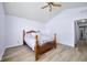 Bright bedroom with ceiling fan, hardwood floors, and space to spare at 5316 Twin Bridge Blvd, Indianapolis, IN 46239