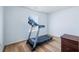 Exercise room featuring a treadmill and wood floors at 5316 Twin Bridge Blvd, Indianapolis, IN 46239
