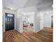 Open foyer with wood floors, views into multiple rooms and lots of light at 5316 Twin Bridge Blvd, Indianapolis, IN 46239