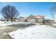Charming brick home featuring an attached three car garage and well-maintained landscaping at 5316 Twin Bridge Blvd, Indianapolis, IN 46239