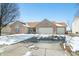 Charming brick home featuring an attached three car garage and well-maintained landscaping at 5316 Twin Bridge Blvd, Indianapolis, IN 46239
