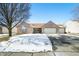 Charming brick home featuring an attached three car garage and well-maintained landscaping at 5316 Twin Bridge Blvd, Indianapolis, IN 46239
