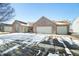 Charming brick home featuring an attached three car garage and well-maintained landscaping at 5316 Twin Bridge Blvd, Indianapolis, IN 46239