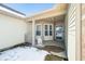 Welcoming covered front porch with neutral tones, and a 'Welcome' sign at 5316 Twin Bridge Blvd, Indianapolis, IN 46239