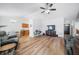 Inviting open-concept living room with sleek wood floors and modern lighting at 5316 Twin Bridge Blvd, Indianapolis, IN 46239