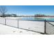A picturesque pond provides a scenic backdrop, enhancing the neighborhood's charm and appeal at 5316 Twin Bridge Blvd, Indianapolis, IN 46239