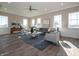 Inviting living room featuring neutral decor, comfortable seating, and an abundance of natural light at 5558 Tart Blvd, Indianapolis, IN 46239