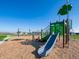 Community playground including a slide and swings creating a fun recreational space at 5558 Tart Blvd, Indianapolis, IN 46239