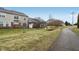 A view of a large backyard with a path showing the exterior of a home at 5682 Castor Way, Noblesville, IN 46062