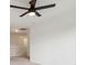 Spacious room with a ceiling fan and a stairway in a well-lit area at 5682 Castor Way, Noblesville, IN 46062