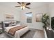 Serene bedroom with plush bedding, ample natural light, and tasteful accents, offering a peaceful retreat at 5682 Castor Way, Noblesville, IN 46062