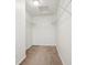 Walk-in closet with carpeted floors, overhead lighting, and wire shelving for optimal storage at 5682 Castor Way, Noblesville, IN 46062