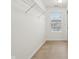 Walk-in closet with wire shelving and a window, offering plenty of natural light at 5682 Castor Way, Noblesville, IN 46062