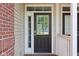 A welcoming front door features a glass insert and sidelight at 5682 Castor Way, Noblesville, IN 46062