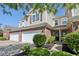 Charming townhouse featuring brick accents, a well-maintained yard, and inviting front entrance at 5682 Castor Way, Noblesville, IN 46062