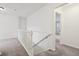 Bright second floor hallway with white trim and doors, carpeted floors, and recessed lighting at 5682 Castor Way, Noblesville, IN 46062