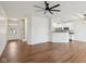 Open-concept living space with hardwood floors, connecting to the kitchen and foyer at 5682 Castor Way, Noblesville, IN 46062