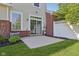 Cozy patio with sliding glass doors, and well-kept lawn and landscaping at 5682 Castor Way, Noblesville, IN 46062