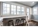 Kitchen seating area with stools and a view of the backyard at 5736 Central Ave, Indianapolis, IN 46220