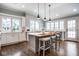 Spacious kitchen featuring a large island, modern appliances, and ample natural light at 5736 Central Ave, Indianapolis, IN 46220