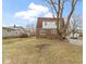 Expansive backyard featuring a mix of lawn and large tree, perfect for outdoor activities and enjoying nature at 5814 Beechwood Ave, Indianapolis, IN 46219