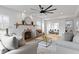 Cozy living room features a fireplace, natural light, hardwood floors, and comfortable seating area at 5814 Beechwood Ave, Indianapolis, IN 46219