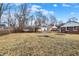 Large backyard with space for outdoor activities and potential landscaping opportunities at 6104 Gifford St, Indianapolis, IN 46228