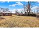 Expansive backyard featuring mature trees, a well-maintained lawn, and ample space for outdoor entertainment at 6104 Gifford St, Indianapolis, IN 46228