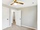 Neutral colored bedroom with carpet flooring, a closet, and natural light at 6104 Gifford St, Indianapolis, IN 46228
