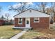 Charming brick home with a classic design and inviting front entrance at 6104 Gifford St, Indianapolis, IN 46228
