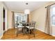 Dining room with a modern pendant light and sliding glass doors at 647 Mulford Ct, Indianapolis, IN 46234