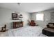 Cozy basement area with a reading nook, plush chair, and a decorative rug for added comfort at 649 Hummingbird Dr, Brownsburg, IN 46112