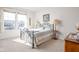 Cozy bedroom with carpet and a large window providing natural light at 649 Hummingbird Dr, Brownsburg, IN 46112