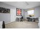 Functional craft room with sewing machines, craft tables, and storage for creative projects at 649 Hummingbird Dr, Brownsburg, IN 46112